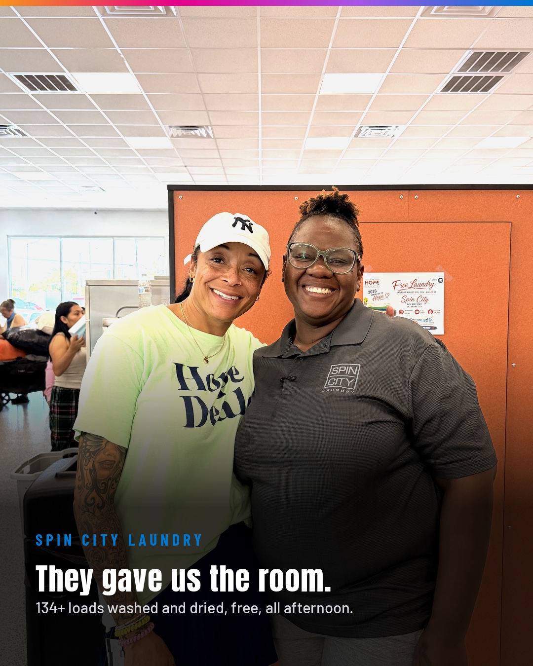 J’Shawna Smith in a Hope Dealer shirt with a Spin City Laundry team member; Spin City provided the laundromat for more than 134 free loads.