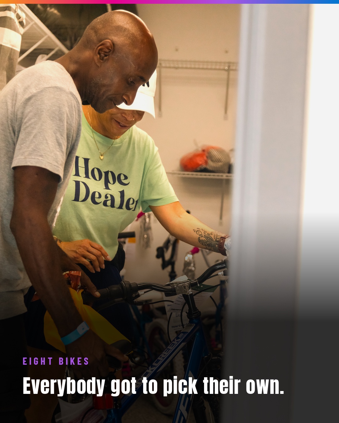 A Hope Dealer helping a guest choose a bicycle; eight bikes were given away.